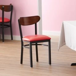 LT&S Boomerang Series Lancaster Table & Seating Boomerang Black Finish Chair With 2 1/2" Red Vinyl Padded Seat And Antique Walnut Wood Back