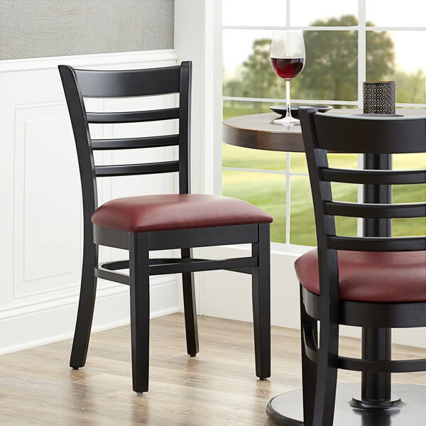 Lancaster Table & Seating Black Finish Wooden Ladder Back Chair With 2 1/2" Burgundy Padded Seat 3 Lancaster Table & Seating Black Finish Wooden Ladder Back Chair With 2 1/2" Burgundy Padded Seat
