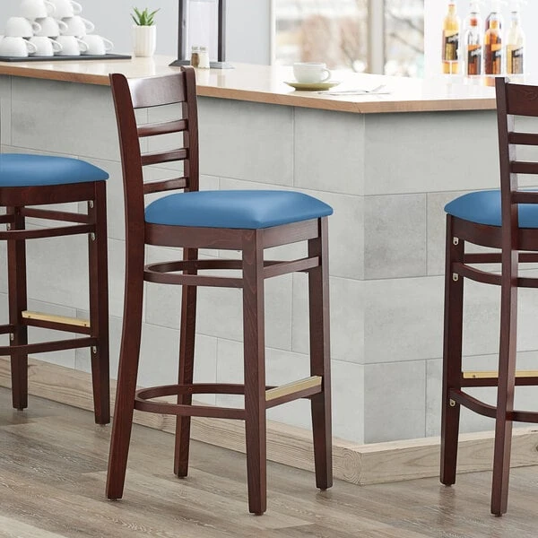 Lancaster Table & Seating Mahogany Finish Wooden Ladder Back Bar Height Chair With Blue Padded Seat 3 Lancaster Table & Seating Mahogany Finish Wooden Ladder Back Bar Height Chair With Blue Padded Seat