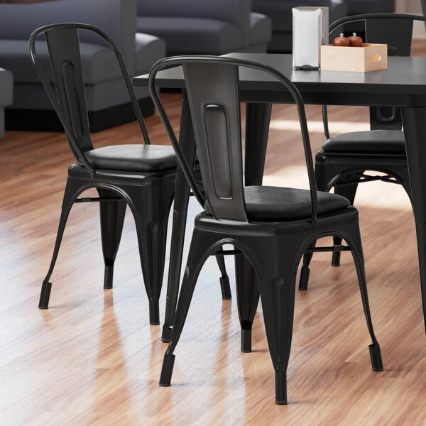LT&S Alloy Series Lancaster Table & Seating Alloy Series Black Metal Indoor Cafe Chair With Black Vinyl Cushion 3 LT&S Alloy Series Lancaster Table & Seating Alloy Series Black Metal Indoor Cafe Chair With Black Vinyl Cushion
