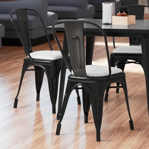 LT&S Alloy Series Lancaster Table & Seating Alloy Series Black Metal Indoor Cafe Chair With White Vinyl Cushion 3 LT&S Alloy Series Lancaster Table & Seating Alloy Series Black Metal Indoor Cafe Chair With White Vinyl Cushion