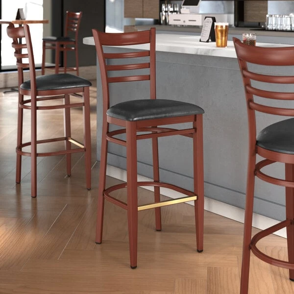 LT&S Spartan Series Lancaster Table & Seating Spartan Series Bar Height Metal Ladder Back Chair With Mahogany Wood Grain Finish And Black Vinyl Seat 3 LT&S Spartan Series Lancaster Table & Seating Spartan Series Bar Height Metal Ladder Back Chair With Mahogany Wood Grain Finish And Black Vinyl Seat