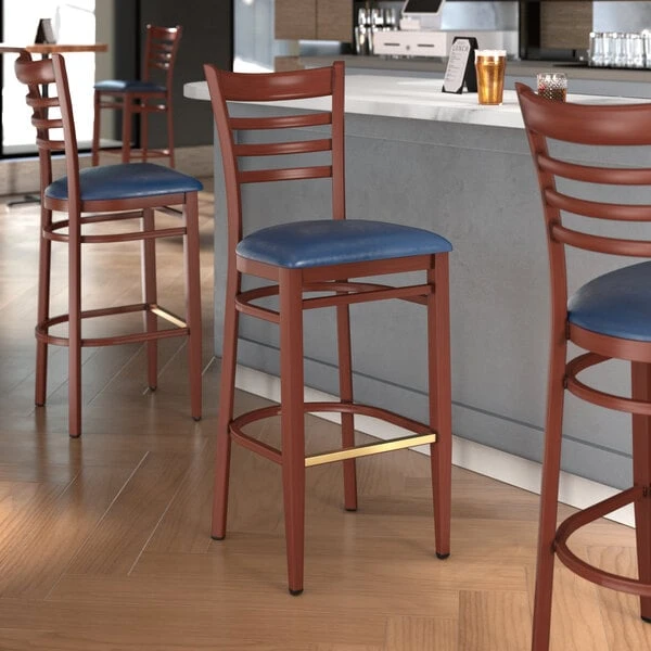 LT&S Spartan Series Lancaster Table & Seating Spartan Series Bar Height Metal Ladder Back Chair With Mahogany Wood Grain Finish And Navy Vinyl Seat 3 LT&S Spartan Series Lancaster Table & Seating Spartan Series Bar Height Metal Ladder Back Chair With Mahogany Wood Grain Finish And Navy Vinyl Seat