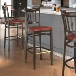 LT&S Spartan Series Lancaster Table & Seating Spartan Series Bar Height Metal Slat Back Chair With Walnut Wood Grain Finish And Burgundy Vinyl Seat