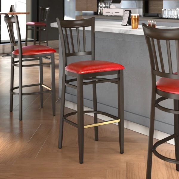 LT&S Spartan Series Lancaster Table & Seating Spartan Series Bar Height Metal Slat Back Chair With Walnut Wood Grain Finish And Red Vinyl Seat 3 LT&S Spartan Series Lancaster Table & Seating Spartan Series Bar Height Metal Slat Back Chair With Walnut Wood Grain Finish And Red Vinyl Seat