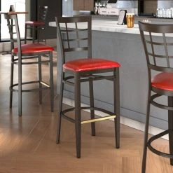 LT&S Spartan Series Lancaster Table & Seating Spartan Series Bar Height Metal Window Back Chair With Walnut Wood Grain Finish And Red Vinyl Seat