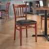 LT&S Spartan Series Lancaster Table & Seating Spartan Series Metal Slat Back Chair With Mahogany Wood Grain Finish And Black Vinyl Seat
