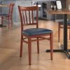 LT&S Spartan Series Lancaster Table & Seating Spartan Series Metal Slat Back Chair With Mahogany Wood Grain Finish And Navy Vinyl Seat