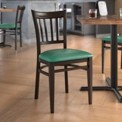 LT&S Spartan Series Lancaster Table & Seating Spartan Series Metal Slat Back Chair With Walnut Wood Grain Finish And Green Vinyl Seat