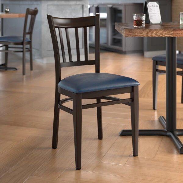 LT&S Spartan Series Lancaster Table & Seating Spartan Series Metal Slat Back Chair With Walnut Wood Grain Finish And Navy Vinyl Seat 3 LT&S Spartan Series Lancaster Table & Seating Spartan Series Metal Slat Back Chair With Walnut Wood Grain Finish And Navy Vinyl Seat