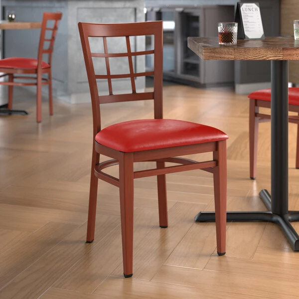 LT&S Spartan Series Lancaster Table & Seating Spartan Series Metal Window Back Chair With Mahogany Wood Grain Finish And Red Vinyl Seat 3 LT&S Spartan Series Lancaster Table & Seating Spartan Series Metal Window Back Chair With Mahogany Wood Grain Finish And Red Vinyl Seat